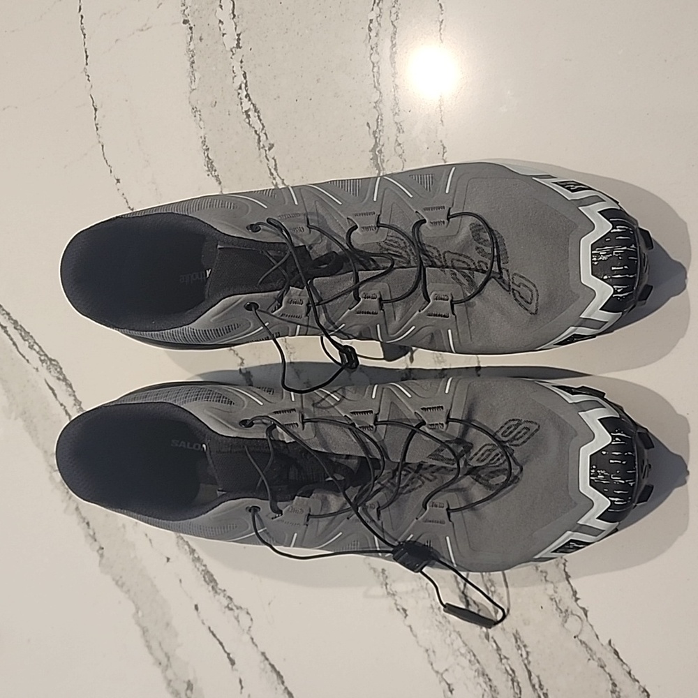 Size 12 Salomon Speed Cross 6 (never worn)
